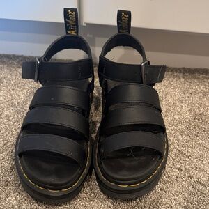 Dr. Martens Black Leather Sandals with Yellow Stitching